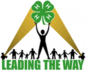 Black silhouettes of a group of people helping to hold up the 4-H Logo with light beams shining. "Leading The Way" is listed below the people. 