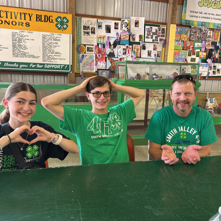 3 people showing heart, head and hands symbolicall